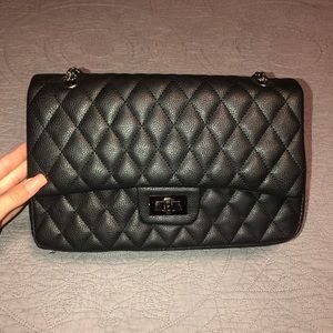 Black quilted purse.